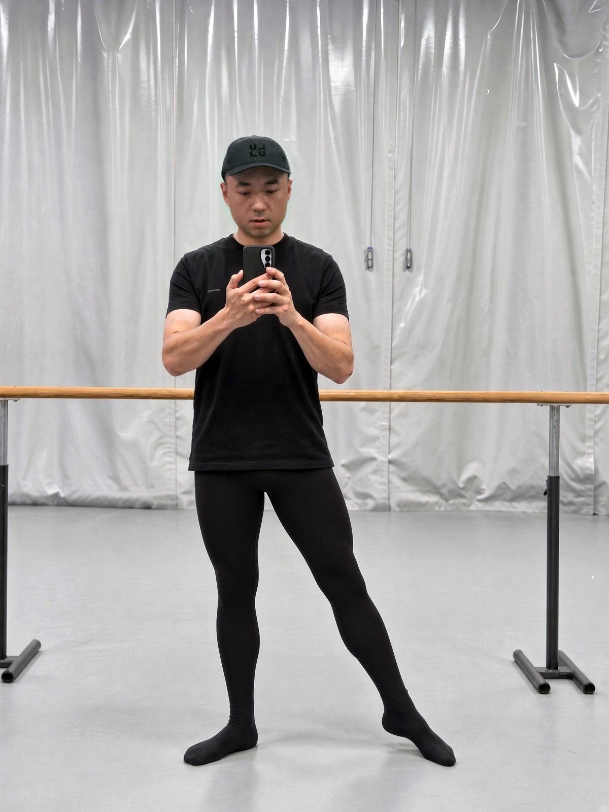 Alexander Wong in a dance studio at the barre